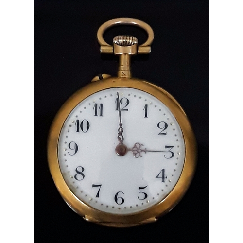 95 - A Continental high carat gold ladies lapel or pocket watch, the reverse set with diamonds and rubies... 