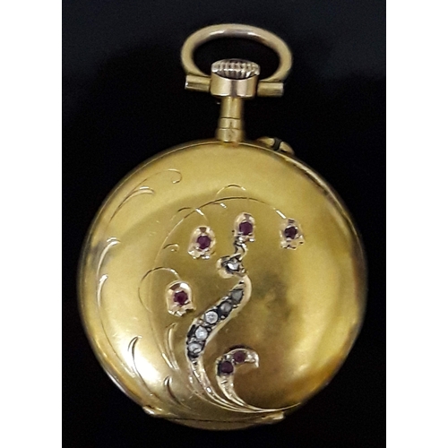 95 - A Continental high carat gold ladies lapel or pocket watch, the reverse set with diamonds and rubies... 