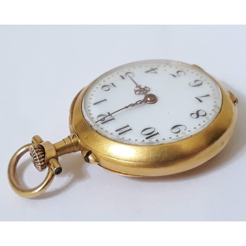 95 - A Continental high carat gold ladies lapel or pocket watch, the reverse set with diamonds and rubies... 