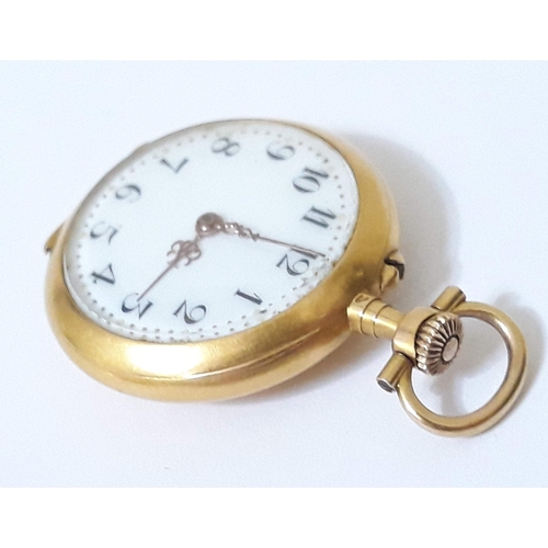 95 - A Continental high carat gold ladies lapel or pocket watch, the reverse set with diamonds and rubies... 