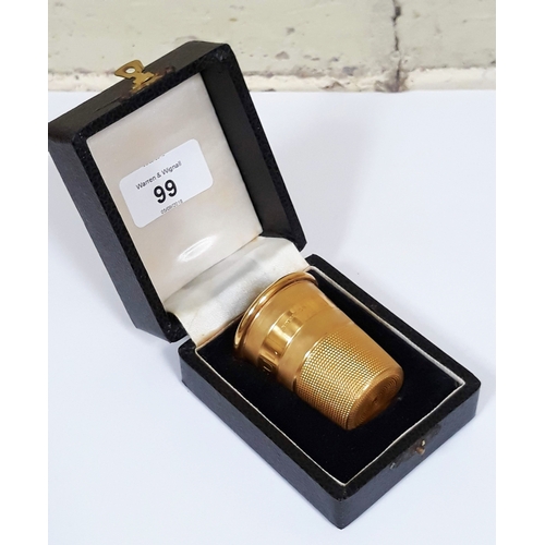 99 - A hallmarked 9ct gold novelty drinking tot modelled as a thimble, inscribed 'Just A Thimble Full', w... 