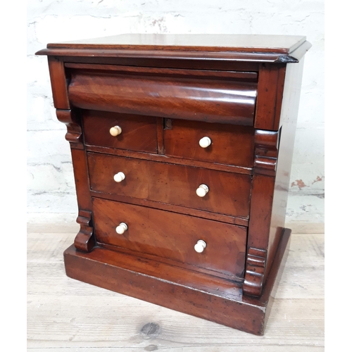 80 - A Victorian miniature or apprentice chest of drawers.