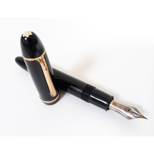 381 - A Montblanc Meisterstuck fountain pen with 14K gold nib.