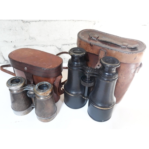 397 - Two pairs of binoculars.