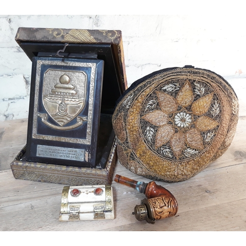 401 - A mixed lot to include a gilt thread tea cosy, a vintage pipe, a bone casket and a Turkish(?) presen... 