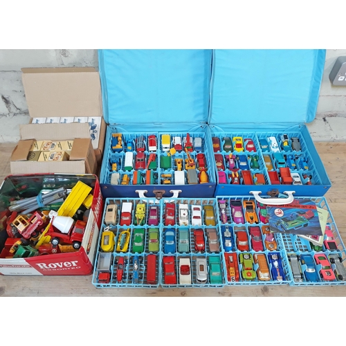 416 - Two matchbox cases and vehicles, a tin of various die cast and other Lledo models.