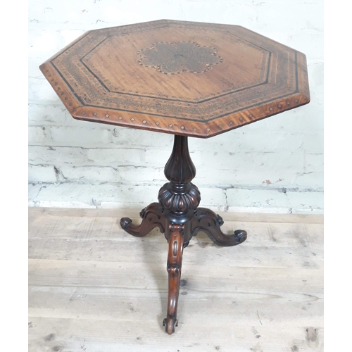 84 - A tripod table with inlaid top and carved rosewood tripod base.