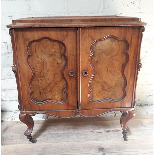 86 - A 19th century walnut cabinet.