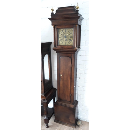 89 - An oak cased 30 hour long case clock with brass dial inscribed 'Tho Binch Mansfield', height 223cm.