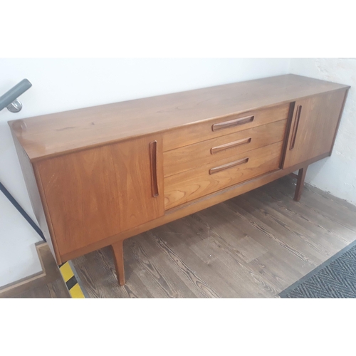 91C - A 1960s teak sideboard, length 184cm.