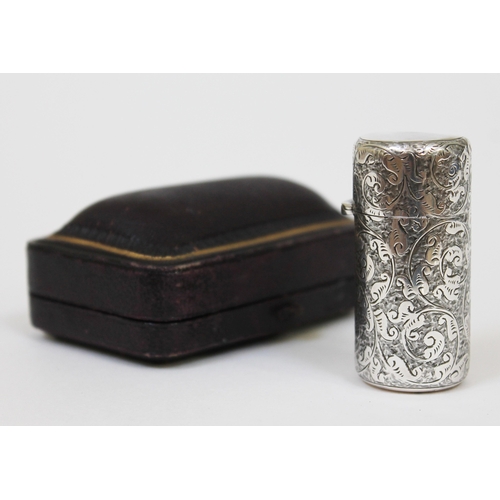 105 - A Victorian chased silver scent bottle, hinged lid with gilt interior and glass stopper, with origin... 