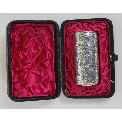 105 - A Victorian chased silver scent bottle, hinged lid with gilt interior and glass stopper, with origin... 