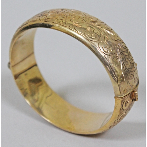 168 - A hallmarked 9ct gold bangle, diam. approx. 6cm, wt. 25.9g.