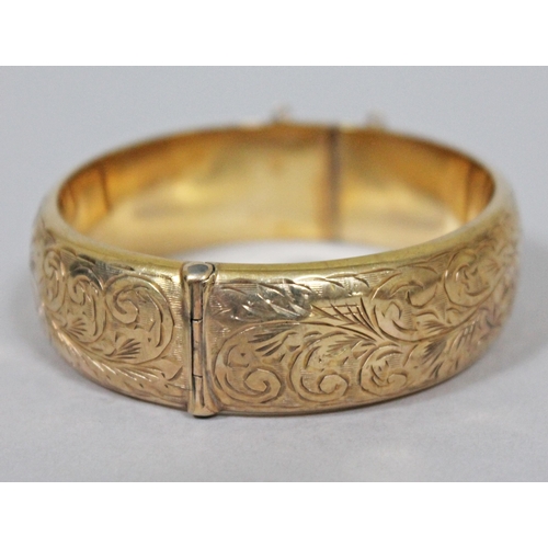 168 - A hallmarked 9ct gold bangle, diam. approx. 6cm, wt. 25.9g.