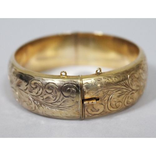 168 - A hallmarked 9ct gold bangle, diam. approx. 6cm, wt. 25.9g.