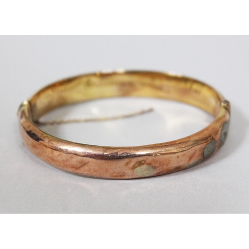 172 - A hallmarked 9ct gold bangle, diam. approx. 5.5cm, wt. 11.7g.