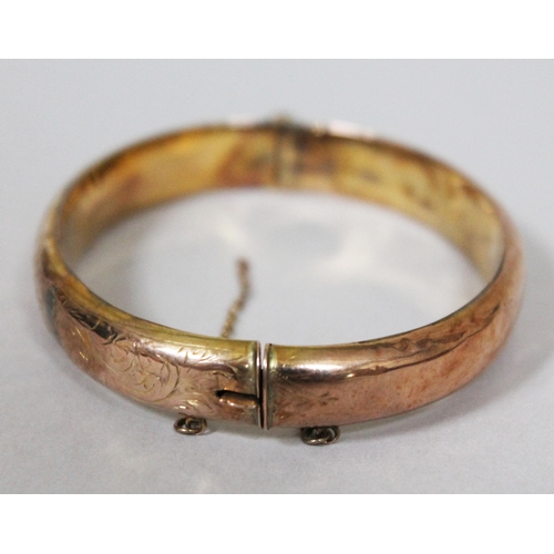 172 - A hallmarked 9ct gold bangle, diam. approx. 5.5cm, wt. 11.7g.