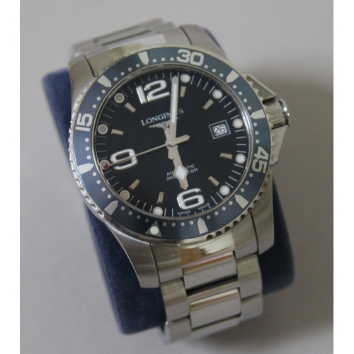 175 - A Longines Hydro Conquest Automatic stainless steel wristwatch, navy blue dial with luminous inlaid ... 