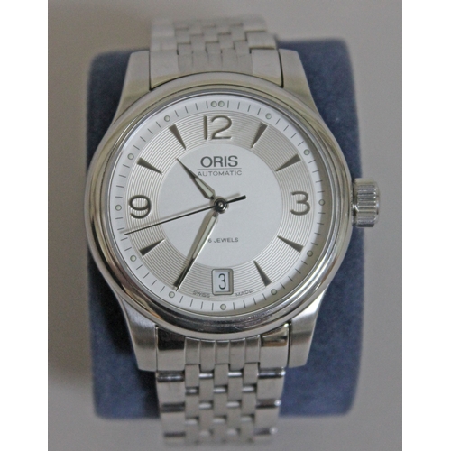 176 - An Oris Classic Date automatic stainless steel wristwatch, silvered dial with exhibition back, with ... 