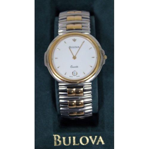 182 - A ladies stainless steel Bulova quartz wristwatch with white dial, gold markers and hands and date a... 