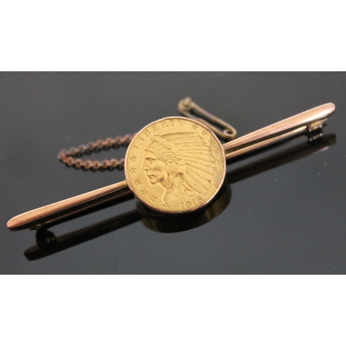 191 - A United States Indian head 1915 gold quarter mounted on bar brooch marked '9ct', length 6.3cm, gros... 