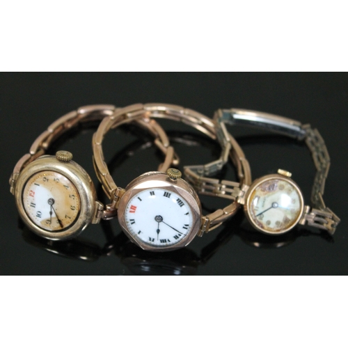 193 - A group of three 9ct gold watches, two with 9ct gold strung straps, the other with a gold plated str... 