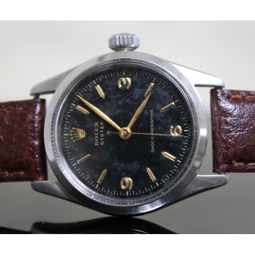 216 - A vintage Rolex Oyster Shock-Resisting stainless steel wristwatch circa 1955, black dial with gold h... 