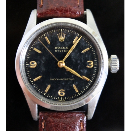 216 - A vintage Rolex Oyster Shock-Resisting stainless steel wristwatch circa 1955, black dial with gold h... 