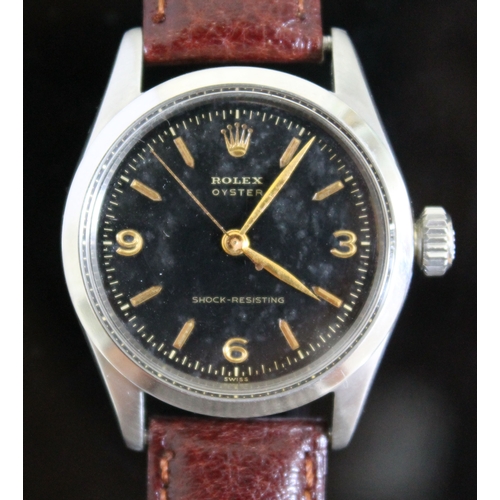 216 - A vintage Rolex Oyster Shock-Resisting stainless steel wristwatch circa 1955, black dial with gold h... 