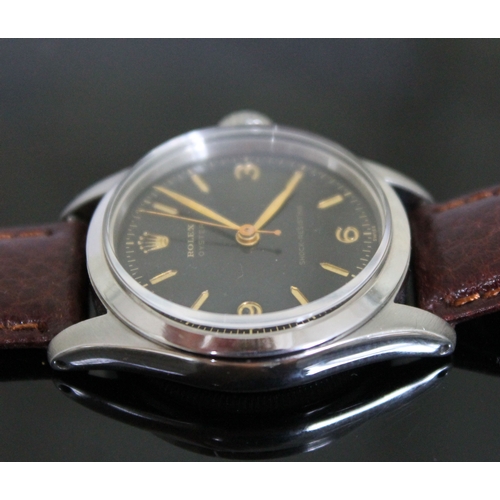 216 - A vintage Rolex Oyster Shock-Resisting stainless steel wristwatch circa 1955, black dial with gold h... 