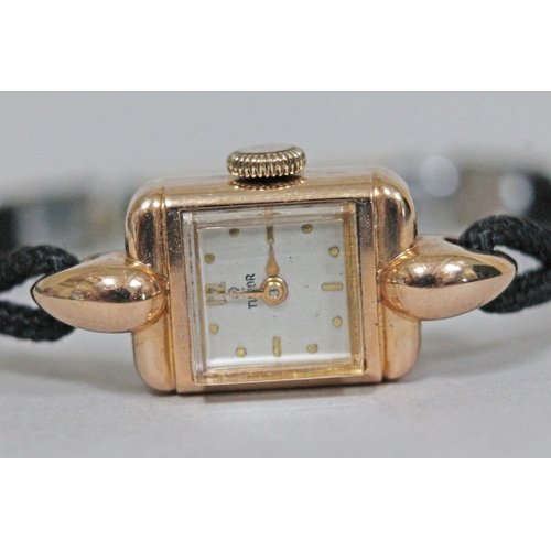 218 - A ladies 18ct gold vintage Rolex Tudor wristwatch with original box and later strap, the back inscri... 