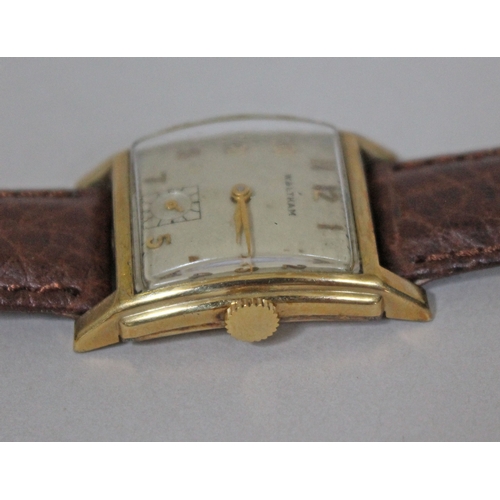 222 - An Art Deco Waltham 10K gold filled wristwatch, width 26mm, later leather strap.