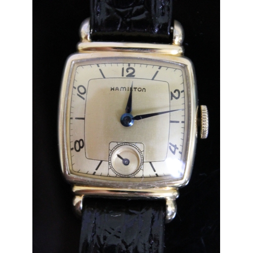 226 - An Art Deco Hamilton gold filled wristwatch, width 23mm, later leather strap.