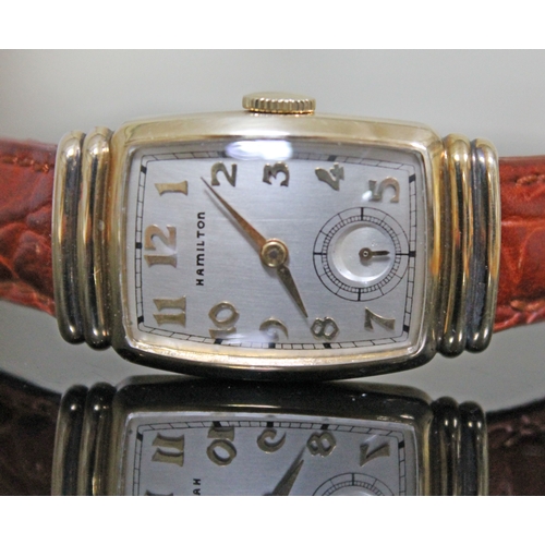 227 - An Art Deco Hamilton 10K gold filled wristwatch, width 21mm, later leather strap.