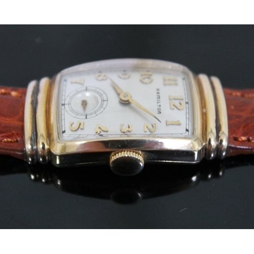 227 - An Art Deco Hamilton 10K gold filled wristwatch, width 21mm, later leather strap.