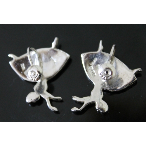 234 - A pair of vintage hallmarked silver and marcasite screw on earrings depicting dancing ballerinas, de... 