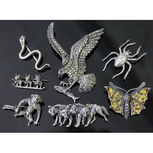 236 - A group of seven silver/white metal vintage animal brooches comprising a wolf pack brooch marked 'SC... 