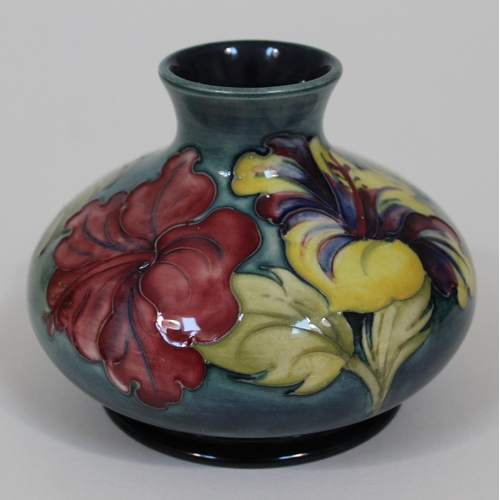 307 - A Moorcroft pottery Hibiscus vase, height 10cm.