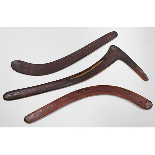 318 - A group of three Aboriginal boomerangs including a swan neck hunting throwing stick.