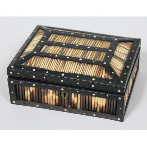 329 - A Victorian ebony and porcupine quill box, length 21cm.