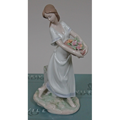 336 - A Lladro figure 'Gardens of Athens' number 7704, height 25cm, with box.