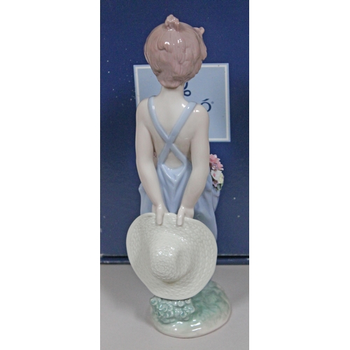 337 - A Lladro figure 'Pocket Full of Wishes' number 7650, height 25cm, with box.