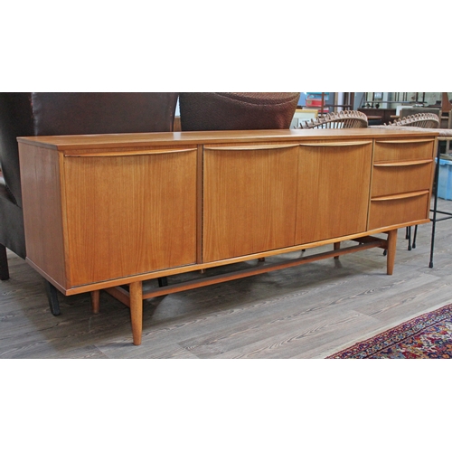 57 - A 1960s teak sideboard, length 198cm.