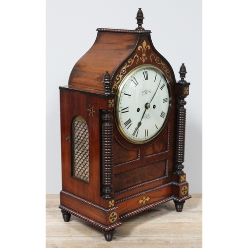 63 - A late Regency brass inlaid mahogany bracket clock, with turned pillars and finials, cockbeading, gi... 