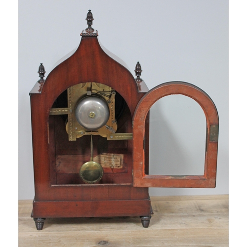 63 - A late Regency brass inlaid mahogany bracket clock, with turned pillars and finials, cockbeading, gi... 