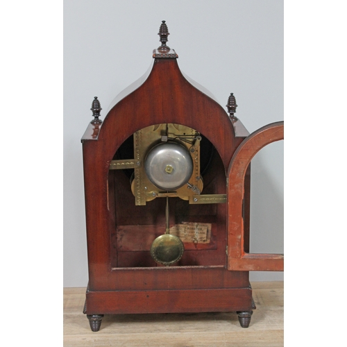 63 - A late Regency brass inlaid mahogany bracket clock, with turned pillars and finials, cockbeading, gi... 