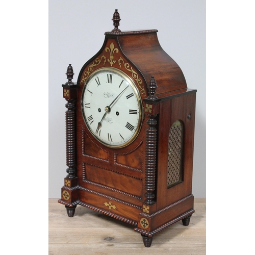 63 - A late Regency brass inlaid mahogany bracket clock, with turned pillars and finials, cockbeading, gi... 