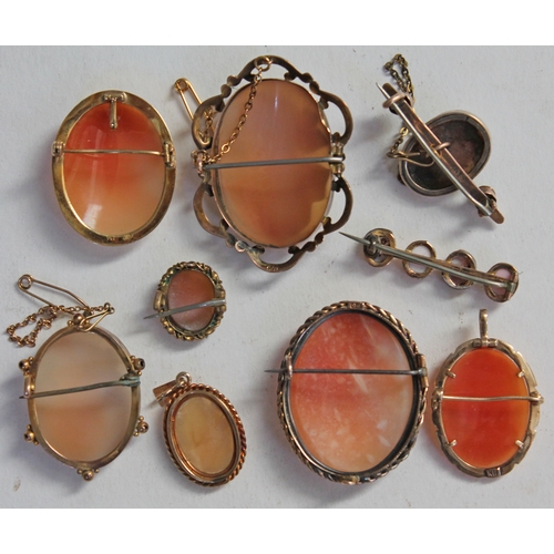 240 - A group of nine gold and yellow metal cameo brooches/pendants, various marks, some unmarked.