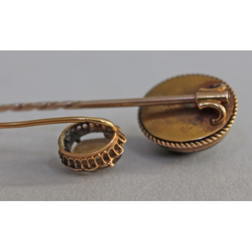 243 - A Victorian yellow metal garnet cabochon and pearl stick pin and another set with a citrine coloured... 