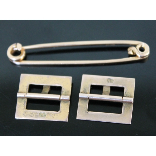 248 - A pair of Victorian 9ct gold buckles and a 15ct gold bar brooch, gross wt. 5.1g.